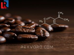 dark-roasted-coffee-beans-next-to-a-diagram-of-the-caffeine-molecular-structure