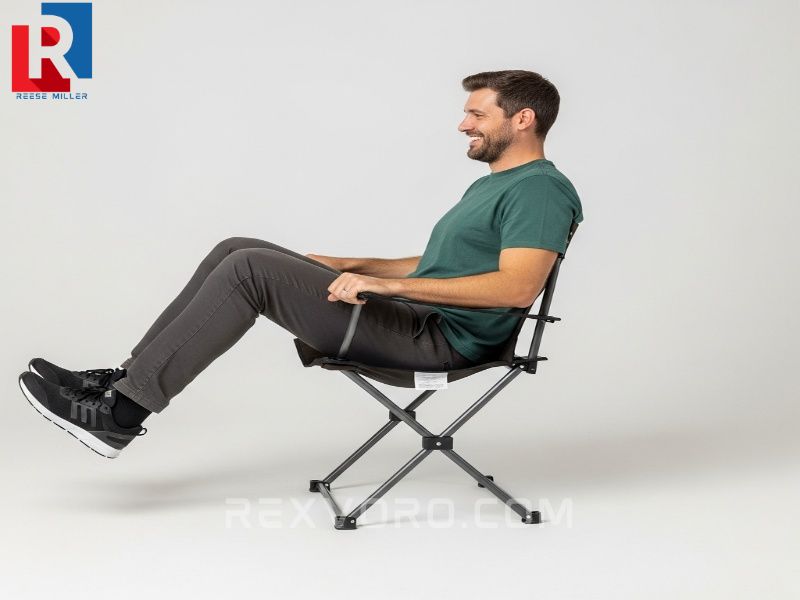 man-performing-the-stand-up-test-easily-rising-from-a-high-back-folding-camping-chair-demonstrating-ease-of-exit-for-tall-users